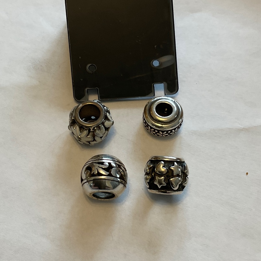 Brighton, silver, and black charm beads
